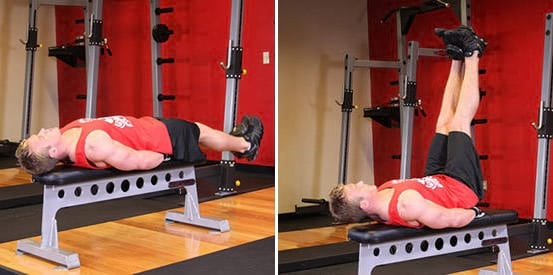 how to perform the lying leg raise exercise https://get-strong.fit/Flat-Bench-Lying-Leg-Raise-How-To-Exercise-Guide/Exercises